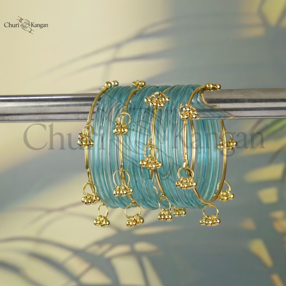 Aqua blue glossy jelly kangan bangles with gold detailing