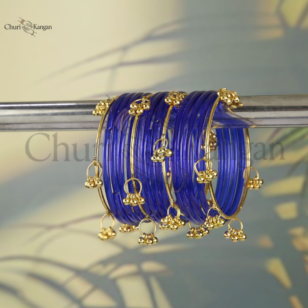 Blue glossy jelly kangan bangles with golden detailing